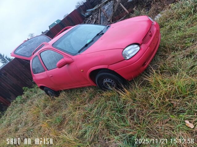 Красный Опель Корса, объемом двигателя 1.2 л и пробегом 250 тыс. км за 1182 $, фото 3 на Automoto.ua