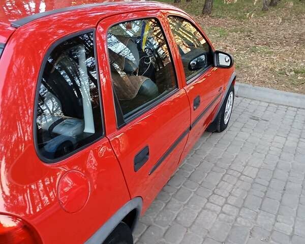 Красный Опель Корса, объемом двигателя 1.2 л и пробегом 130 тыс. км за 2800 $, фото 8 на Automoto.ua