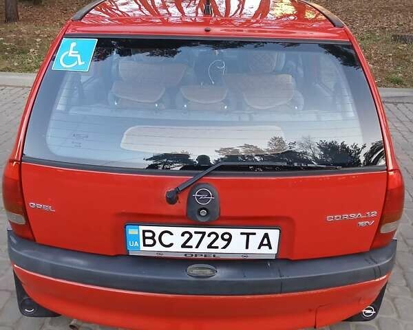Красный Опель Корса, объемом двигателя 1.2 л и пробегом 130 тыс. км за 2800 $, фото 7 на Automoto.ua