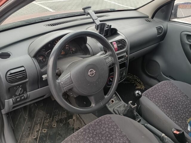 Красный Опель Корса, объемом двигателя 1.4 л и пробегом 188 тыс. км за 2900 $, фото 6 на Automoto.ua