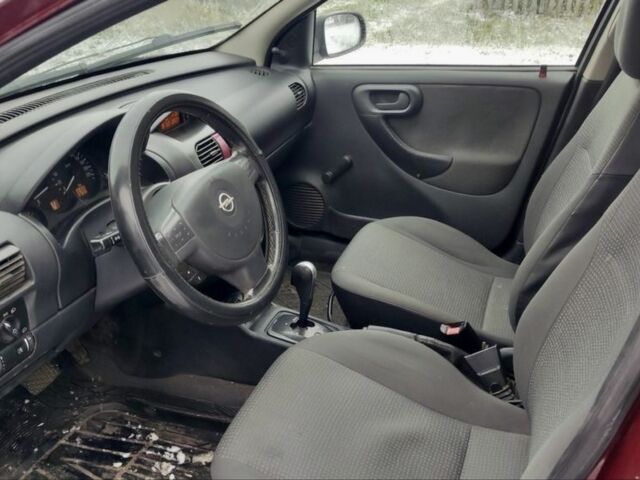 Красный Опель Корса, объемом двигателя 1 л и пробегом 216 тыс. км за 3300 $, фото 7 на Automoto.ua