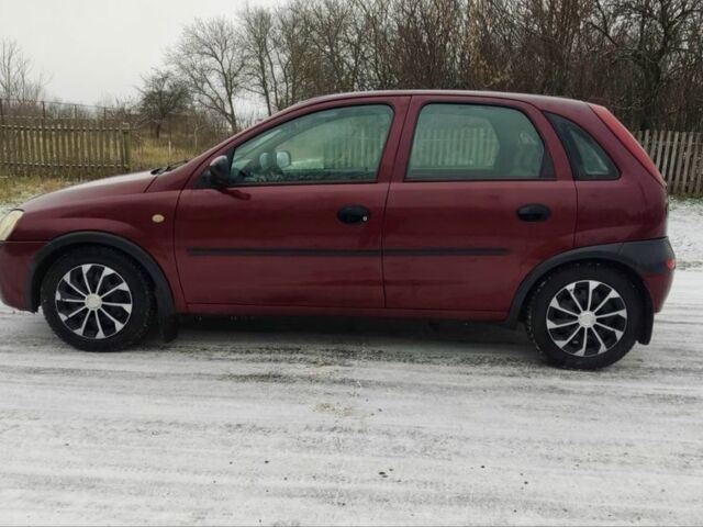 Красный Опель Корса, объемом двигателя 1 л и пробегом 216 тыс. км за 3300 $, фото 2 на Automoto.ua