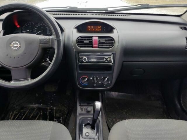 Красный Опель Корса, объемом двигателя 1 л и пробегом 216 тыс. км за 3300 $, фото 6 на Automoto.ua