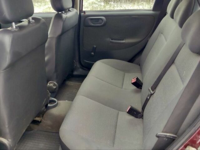 Красный Опель Корса, объемом двигателя 1 л и пробегом 216 тыс. км за 3300 $, фото 8 на Automoto.ua