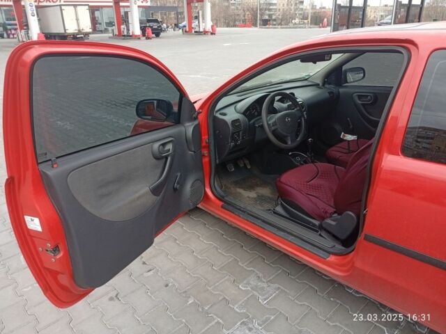 Червоний Опель Корса, об'ємом двигуна 1 л та пробігом 270 тис. км за 2936 $, фото 4 на Automoto.ua