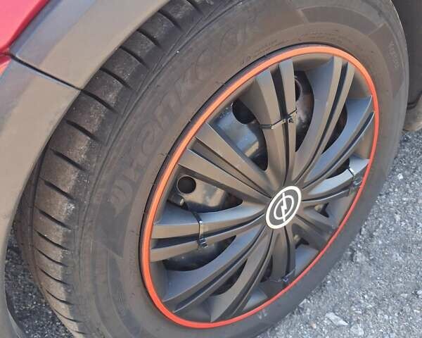 Красный Опель Корса, объемом двигателя 1.2 л и пробегом 194 тыс. км за 3200 $, фото 10 на Automoto.ua