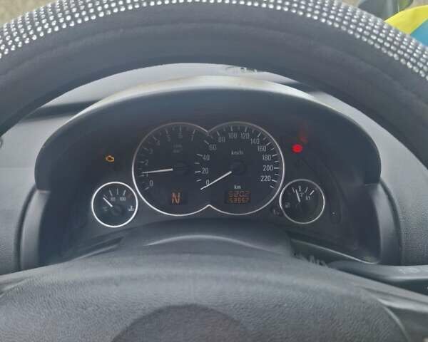 Опель Корса 2003 в Каменское - Днепродзержинск на Automoto.ua Красный Опель Корса, объемом двигателя 1 л и пробегом 153 тыс. км за 3200 $, фото 5 на Automoto.ua