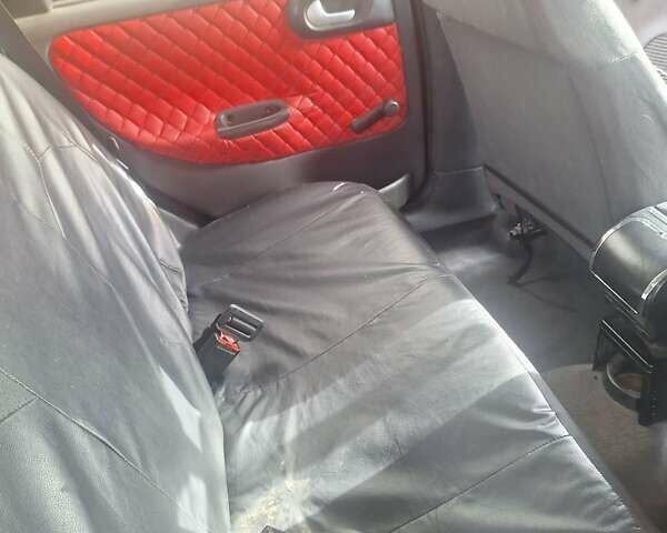 Опель Корса 2003 в Каменское - Днепродзержинск на Automoto.ua Красный Опель Корса, объемом двигателя 1 л и пробегом 153 тыс. км за 3200 $, фото 2 на Automoto.ua