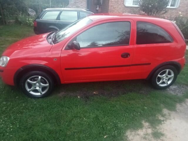 Красный Опель Корса, объемом двигателя 1 л и пробегом 279 тыс. км за 2500 $, фото 1 на Automoto.ua