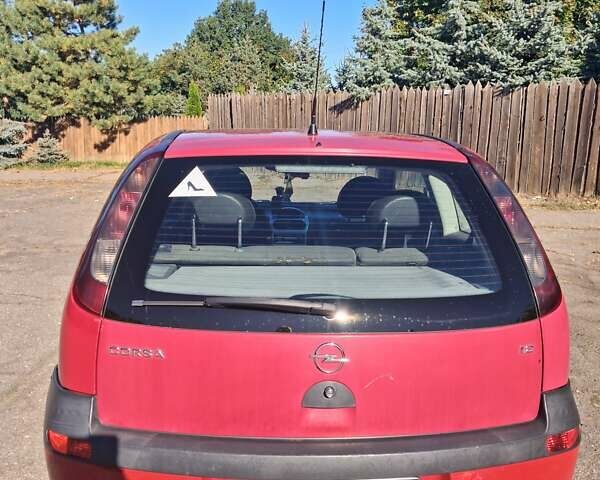 Красный Опель Корса, объемом двигателя 1.2 л и пробегом 194 тыс. км за 3200 $, фото 1 на Automoto.ua