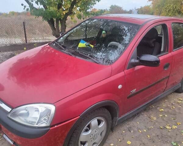 Опель Корса 2003 в Каменское - Днепродзержинск на Automoto.ua Красный Опель Корса, объемом двигателя 1 л и пробегом 153 тыс. км за 3200 $, фото 16 на Automoto.ua