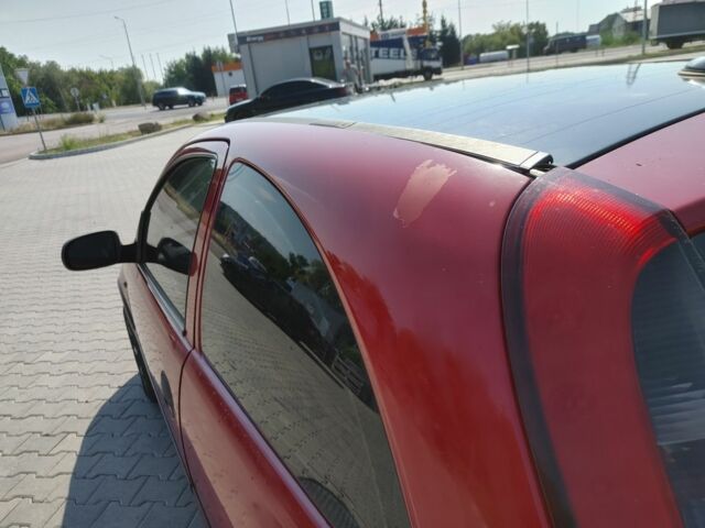 Красный Опель Корса, объемом двигателя 1 л и пробегом 194 тыс. км за 1900 $, фото 15 на Automoto.ua