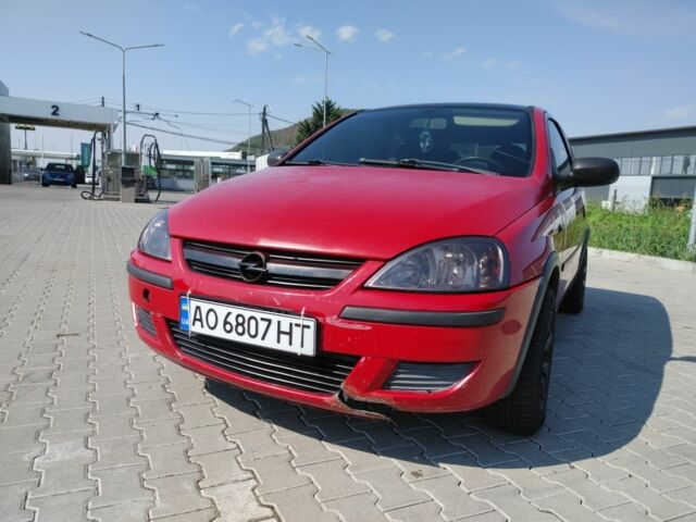 Красный Опель Корса, объемом двигателя 1 л и пробегом 194 тыс. км за 1900 $, фото 6 на Automoto.ua