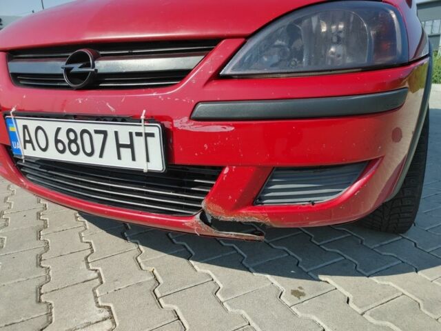 Красный Опель Корса, объемом двигателя 1 л и пробегом 194 тыс. км за 1900 $, фото 5 на Automoto.ua