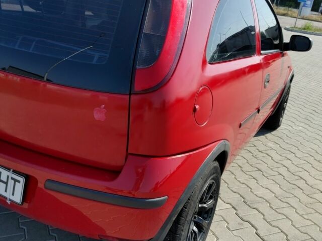 Красный Опель Корса, объемом двигателя 1 л и пробегом 194 тыс. км за 1900 $, фото 7 на Automoto.ua