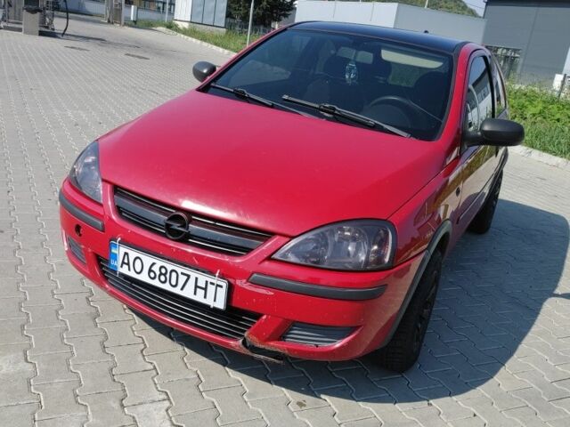 Красный Опель Корса, объемом двигателя 1 л и пробегом 194 тыс. км за 1900 $, фото 4 на Automoto.ua