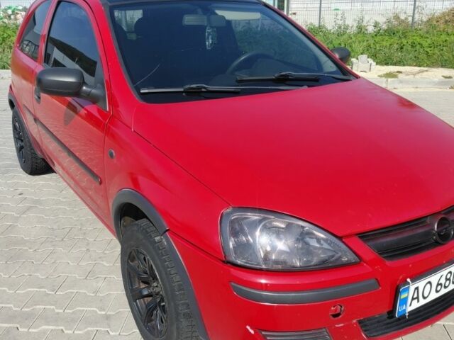 Красный Опель Корса, объемом двигателя 1 л и пробегом 194 тыс. км за 1900 $, фото 9 на Automoto.ua