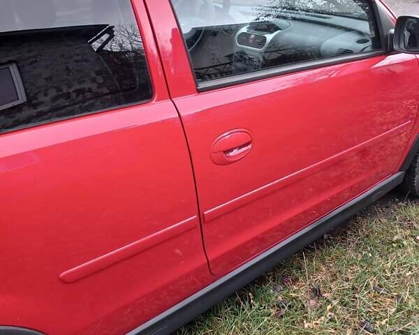 Красный Опель Корса, объемом двигателя 1 л и пробегом 342 тыс. км за 3000 $, фото 8 на Automoto.ua