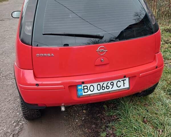 Красный Опель Корса, объемом двигателя 1 л и пробегом 342 тыс. км за 3000 $, фото 2 на Automoto.ua