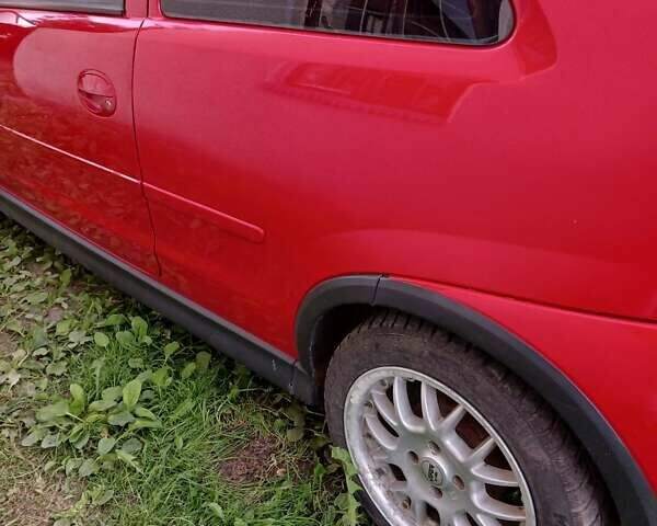 Красный Опель Корса, объемом двигателя 1 л и пробегом 341 тыс. км за 3000 $, фото 10 на Automoto.ua