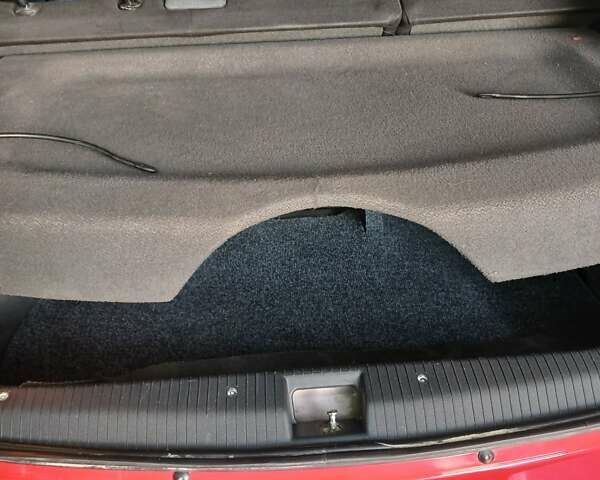 Красный Опель Корса, объемом двигателя 1 л и пробегом 342 тыс. км за 3000 $, фото 13 на Automoto.ua