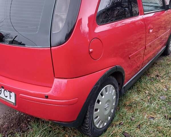 Красный Опель Корса, объемом двигателя 1 л и пробегом 342 тыс. км за 3000 $, фото 5 на Automoto.ua