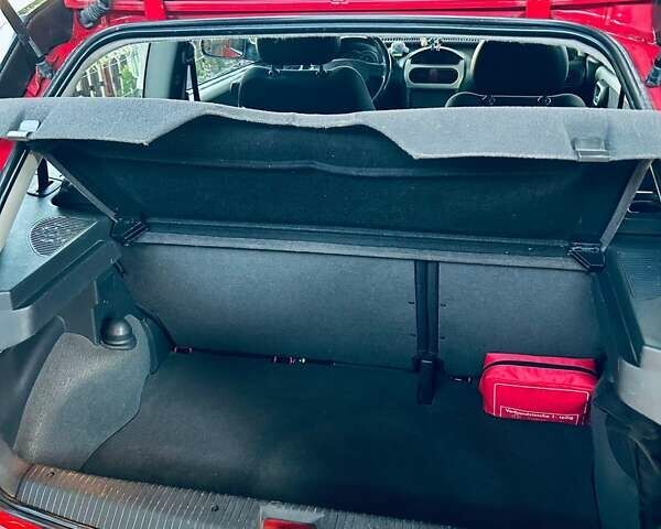 Красный Опель Корса, объемом двигателя 1.2 л и пробегом 191 тыс. км за 4000 $, фото 9 на Automoto.ua