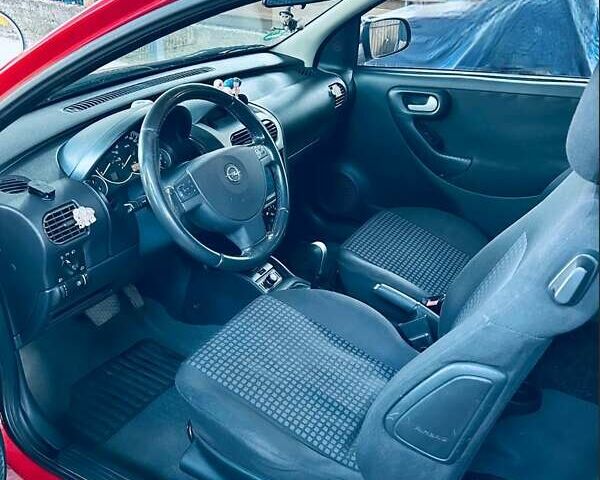 Красный Опель Корса, объемом двигателя 1.2 л и пробегом 191 тыс. км за 4000 $, фото 6 на Automoto.ua