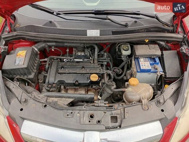 Красный Опель Корса, объемом двигателя 1.23 л и пробегом 270 тыс. км за 3300 $, фото 14 на Automoto.ua