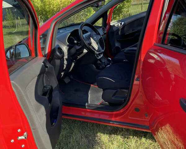 Красный Опель Корса, объемом двигателя 1.23 л и пробегом 135 тыс. км за 6000 $, фото 23 на Automoto.ua