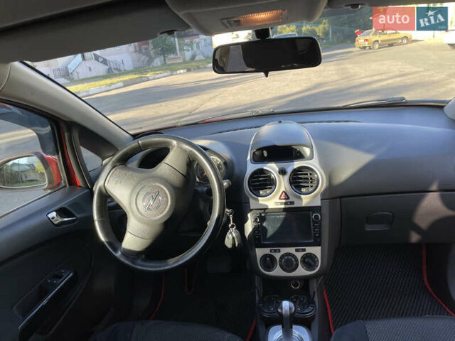 Красный Опель Корса, объемом двигателя 1.23 л и пробегом 135 тыс. км за 6000 $, фото 44 на Automoto.ua