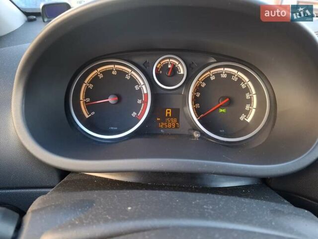 Красный Опель Корса, объемом двигателя 1.23 л и пробегом 125 тыс. км за 4900 $, фото 6 на Automoto.ua