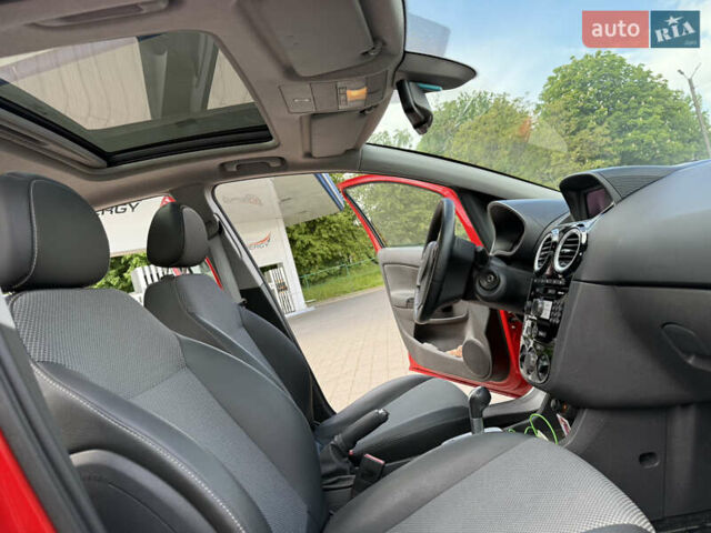 Красный Опель Корса, объемом двигателя 1.23 л и пробегом 127 тыс. км за 6600 $, фото 49 на Automoto.ua