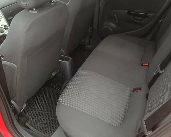 Червоний Опель Корса, об'ємом двигуна 1.25 л та пробігом 230 тис. км за 4200 $, фото 3 на Automoto.ua