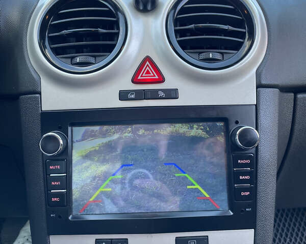 Красный Опель Корса, объемом двигателя 1.23 л и пробегом 135 тыс. км за 6000 $, фото 40 на Automoto.ua