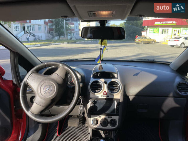 Красный Опель Корса, объемом двигателя 1.23 л и пробегом 135 тыс. км за 6000 $, фото 43 на Automoto.ua