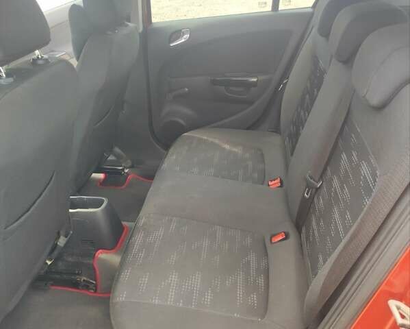 Красный Опель Корса, объемом двигателя 1.36 л и пробегом 184 тыс. км за 6000 $, фото 17 на Automoto.ua