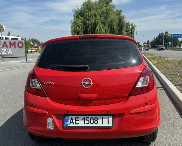 Красный Опель Корса, объемом двигателя 1.23 л и пробегом 131 тыс. км за 5300 $, фото 1 на Automoto.ua