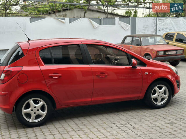 Красный Опель Корса, объемом двигателя 1.25 л и пробегом 176 тыс. км за 6500 $, фото 10 на Automoto.ua