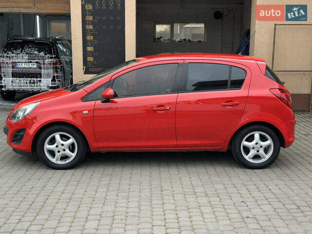 Красный Опель Корса, объемом двигателя 1.25 л и пробегом 176 тыс. км за 6500 $, фото 6 на Automoto.ua