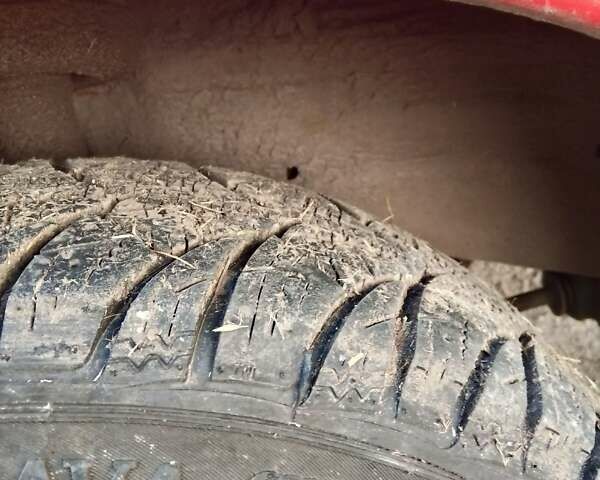 Красный Опель Корса, объемом двигателя 1.2 л и пробегом 200 тыс. км за 500 $, фото 10 на Automoto.ua