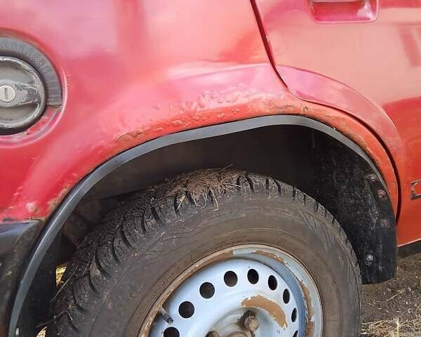 Красный Опель Корса, объемом двигателя 1.2 л и пробегом 200 тыс. км за 500 $, фото 11 на Automoto.ua