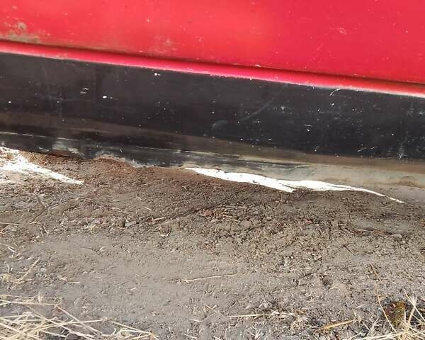 Красный Опель Корса, объемом двигателя 1.2 л и пробегом 200 тыс. км за 500 $, фото 6 на Automoto.ua