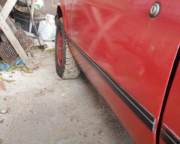 Красный Опель Корса, объемом двигателя 1.2 л и пробегом 200 тыс. км за 500 $, фото 5 на Automoto.ua