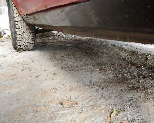 Красный Опель Корса, объемом двигателя 1.2 л и пробегом 200 тыс. км за 500 $, фото 4 на Automoto.ua