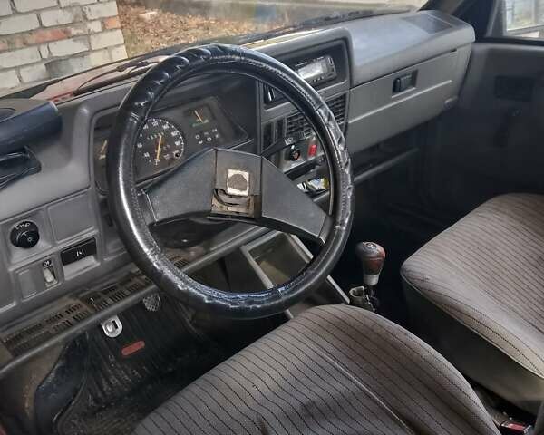 Красный Опель Корса, объемом двигателя 1.2 л и пробегом 200 тыс. км за 500 $, фото 12 на Automoto.ua