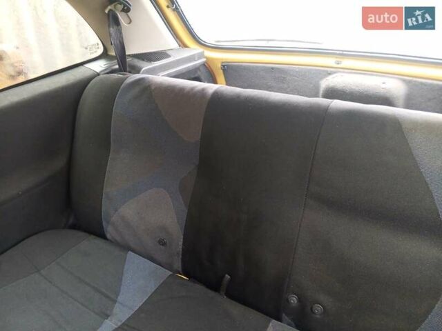 Желтый Опель Корса, объемом двигателя 0.97 л и пробегом 379 тыс. км за 2500 $, фото 6 на Automoto.ua