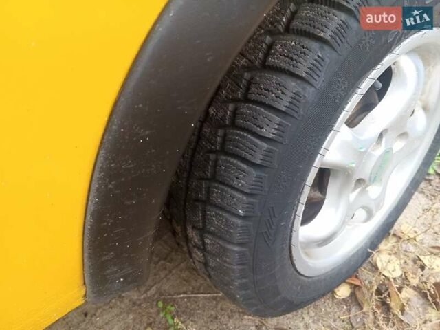 Желтый Опель Корса, объемом двигателя 0.97 л и пробегом 379 тыс. км за 2500 $, фото 11 на Automoto.ua