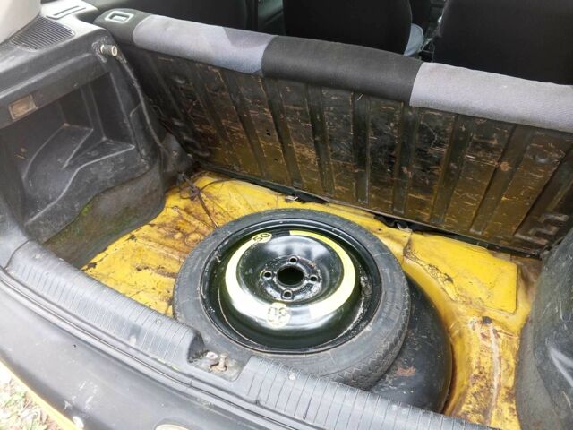 Желтый Опель Корса, объемом двигателя 1 л и пробегом 380 тыс. км за 2500 $, фото 8 на Automoto.ua