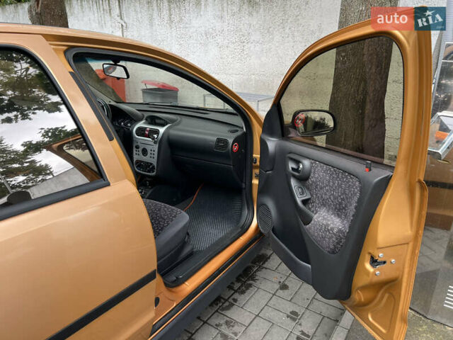 Жовтий Опель Корса, об'ємом двигуна 1.2 л та пробігом 244 тис. км за 3300 $, фото 8 на Automoto.ua